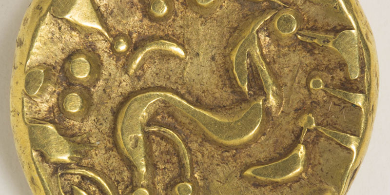 Close up of a gold coin detail