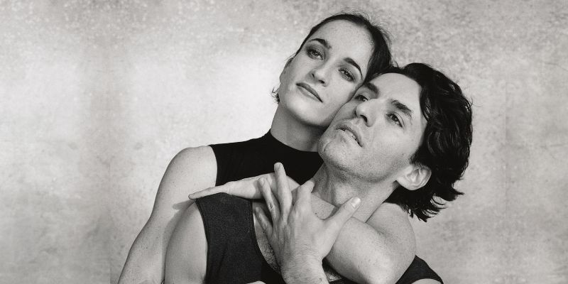 Black and white photograph of two ballet dancers, Daniel de Andrade and Charlotte Broom, in an embrace
