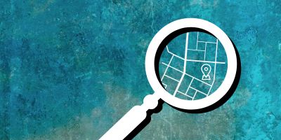 Graphic design of map inside magnifying glass