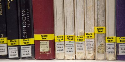 Close-up of some core texts on a Library shelf.