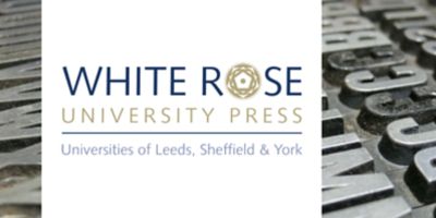 White Rose University Press logo in front of an old printer plate
