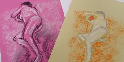 Life drawing sketches on pink and yellow paper