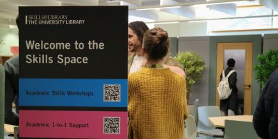 'Welcome to the Skills Space' popup banner with people chatting in the back