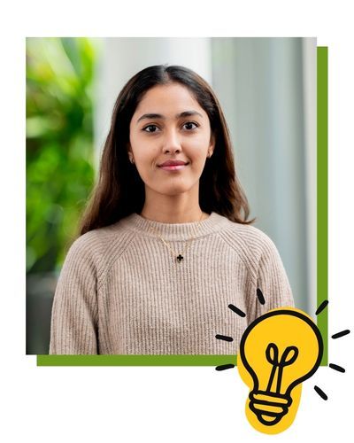 A headshot of student Nitya with lightbulb illustration.